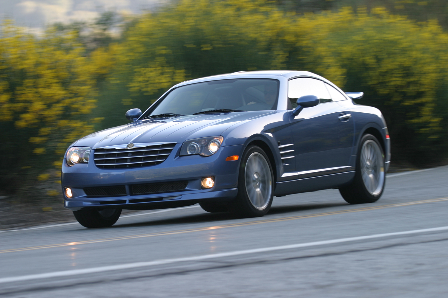 A 2005 Chrysler Crossfire SRT-6 driving down the road